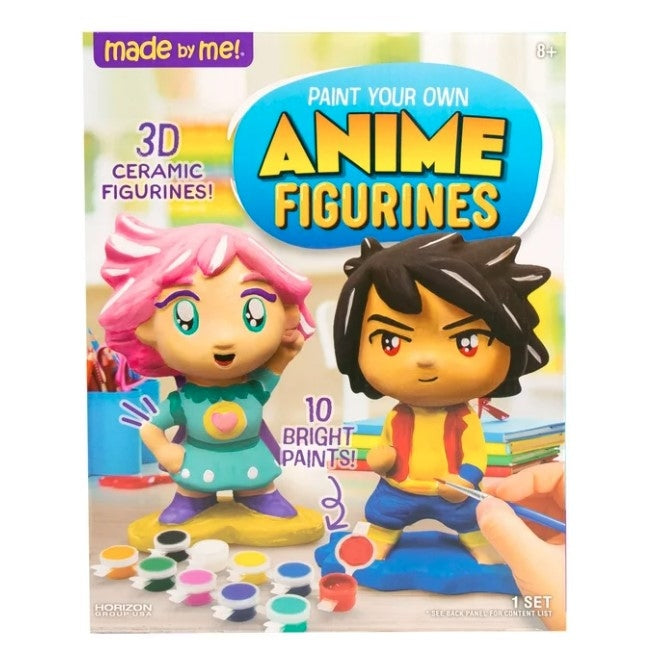 A craft kit of anime figurines. The kit features two cartoon-like figurines, one with pink hair and a green dress, and another with black hair, a yellow shirt, and blue pants.  Paints and a paintbrush are also displayed.